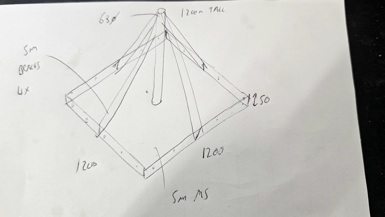 A customer's dimensioned hand sketch ready to be developed for manufacture