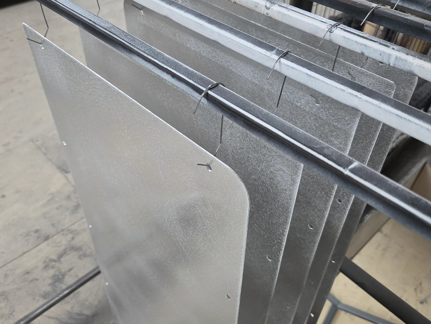 Finished powder-coated sheet-metal panels
