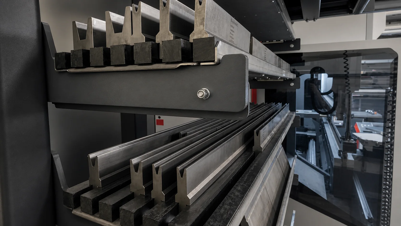 Precision Bystronic press-brake punches and dies ready beside the machine