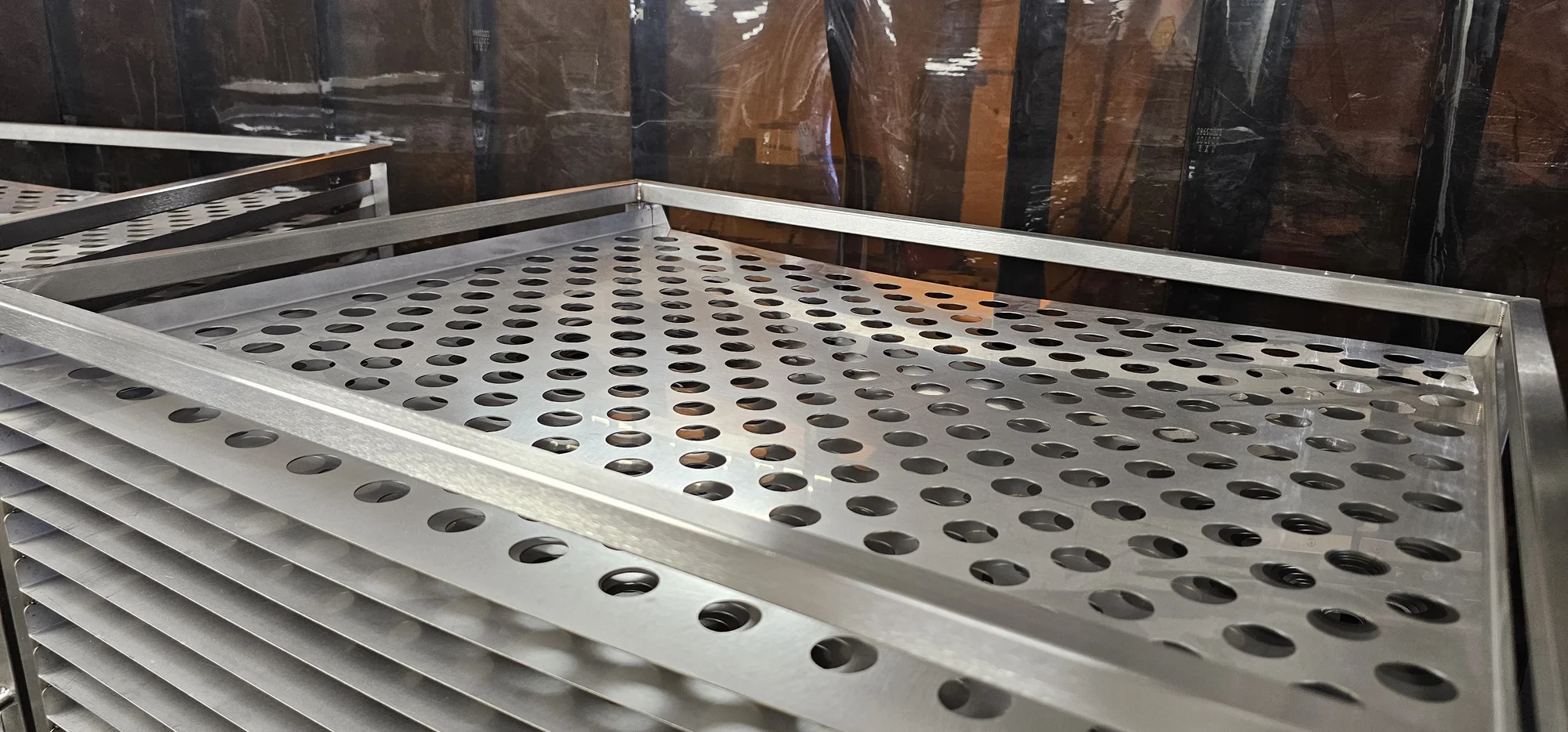 A detailed stainless-steel fabrication made in the Hurstbourne Forge workshop