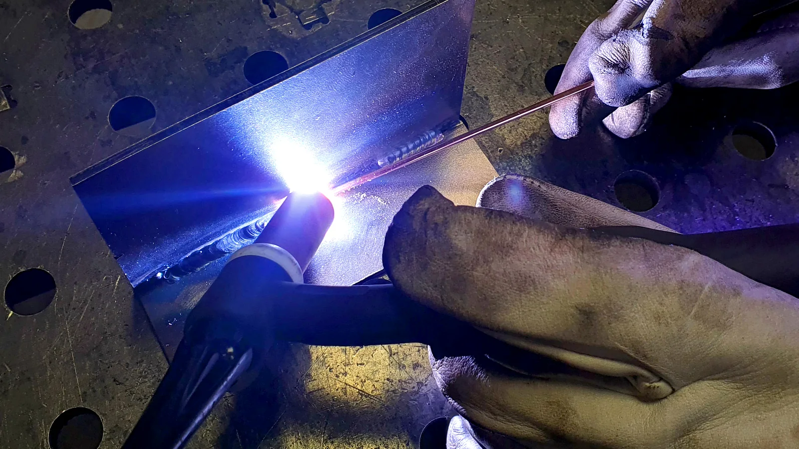 Close-up of TIG welding a fabricated sheet-metal part