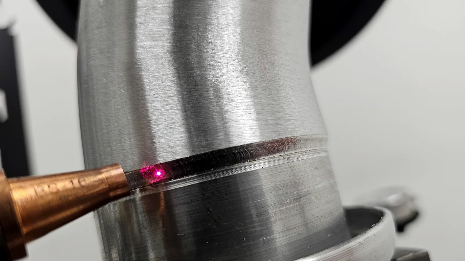 Close inspection of a consistent weld on a stainless fabricated component